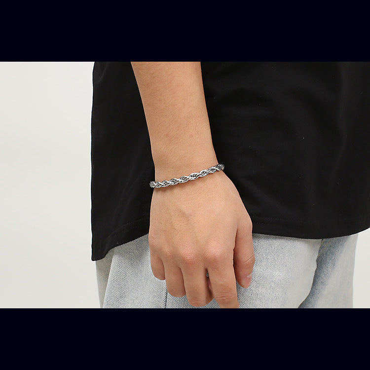 Men's bracelet made of 18k gold-plated stainless steel - braided twisted rope design
