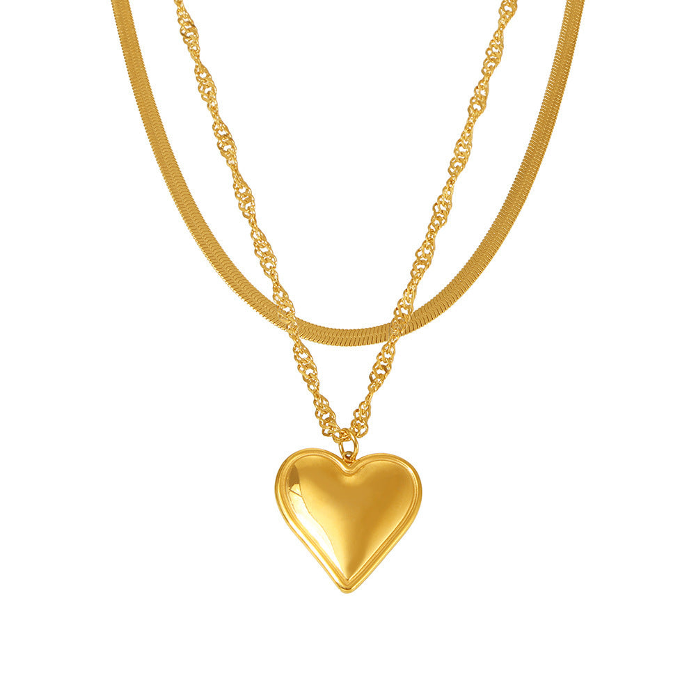 Wave-shaped blade chain with heart pendant | Double-layered stainless steel chain in 18K gold or high-gloss silver look