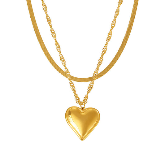 Wave-shaped blade chain with heart pendant | Double-layered stainless steel chain in 18K gold or high-gloss silver look