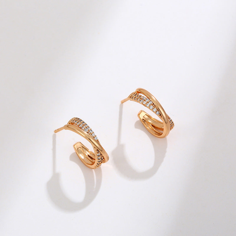 Twisted cross stud earrings 18K gold-plated | Zirconia jewelry | Elegant earrings
