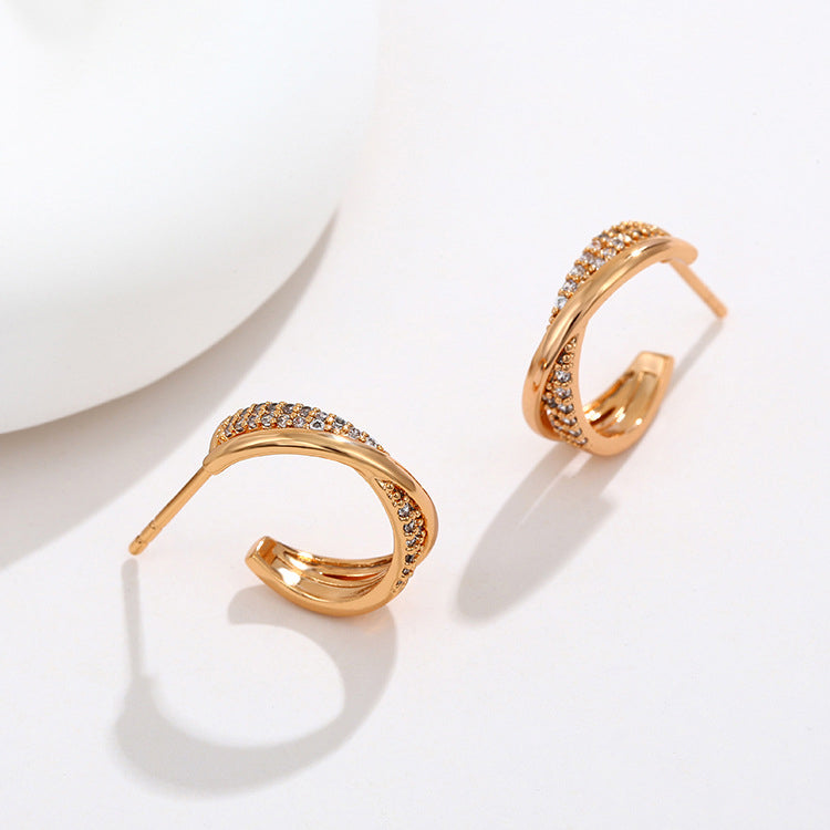 Twisted cross stud earrings 18K gold-plated | Zirconia jewelry | Elegant earrings