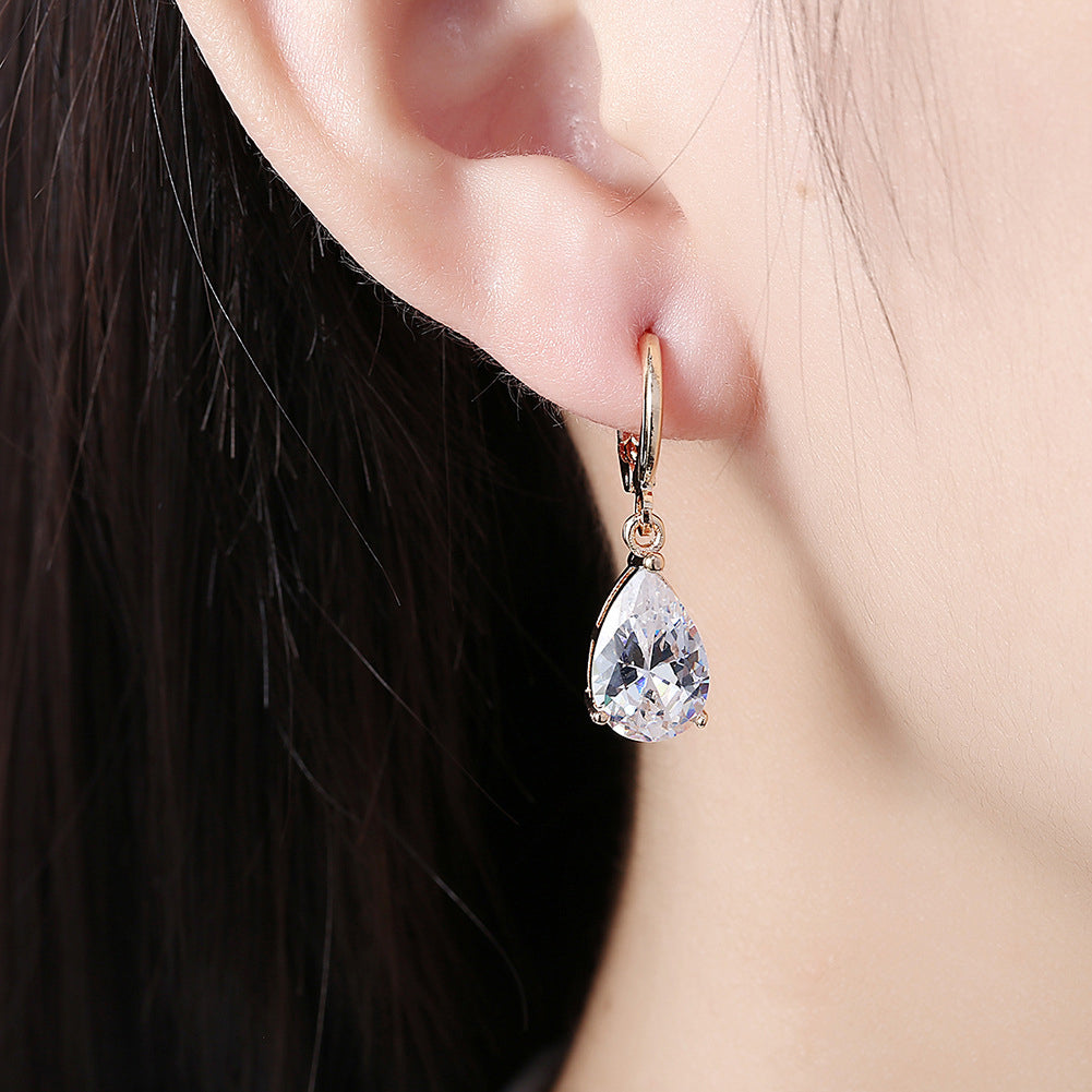 Teardrop zirconia ear clips - copper gold-plated (2.8 cm length)