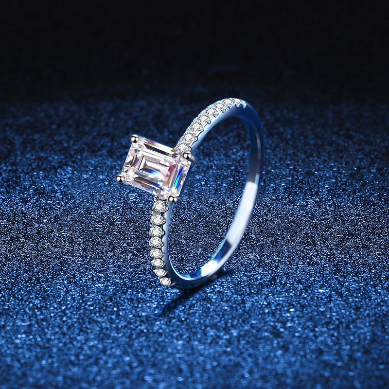 Radiant-cut cubic zirconia ring with 4-claw setting | 1ct main stone (5x7mm) in pavé sterling silver with rhodium plating