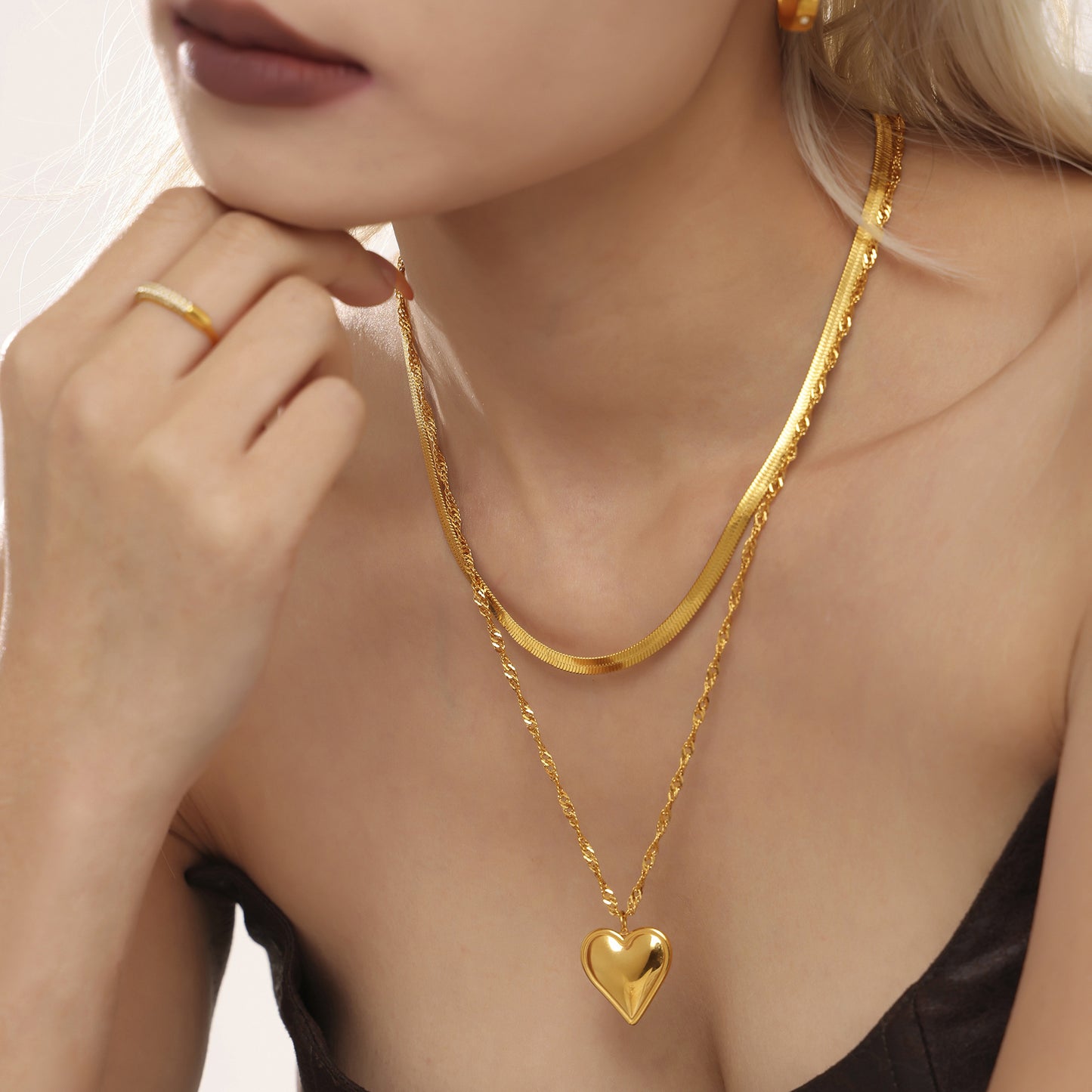 Wave-shaped blade chain with heart pendant | Double-layered stainless steel chain in 18K gold or high-gloss silver look
