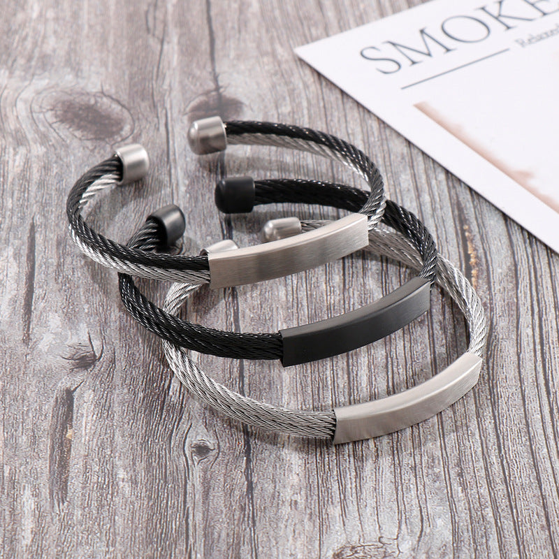 Open men's bracelet made of stainless steel – braided wire rope with twisted look