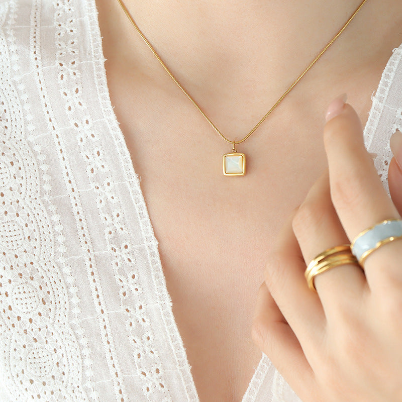 Minimalist square necklace with white shell pendant | Titanium steel 18k gold or steel colors | Understated jewelry design | Scandinavian style