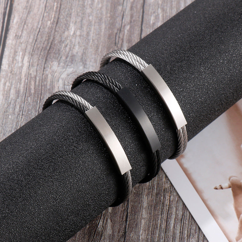 Open men's bracelet made of stainless steel – braided wire rope with twisted look