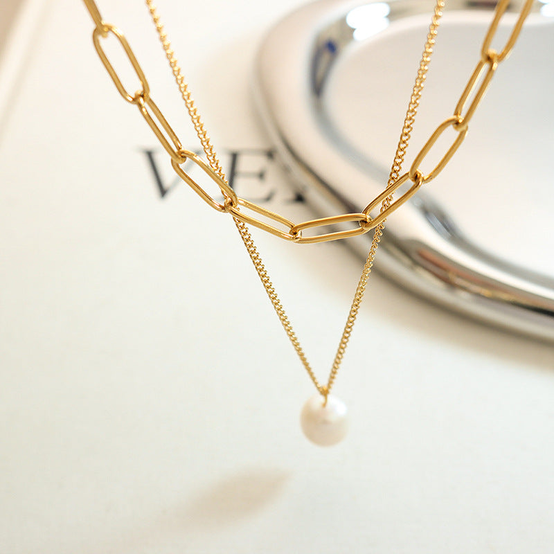 Minimalist pearl necklace with cultured pearl pendant – layered & elegant