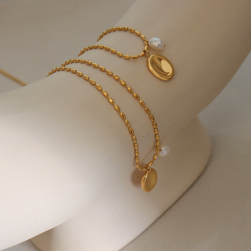 Unique pendant necklace with freshwater pearl & oval plate – gold-plated stainless steel or silver look