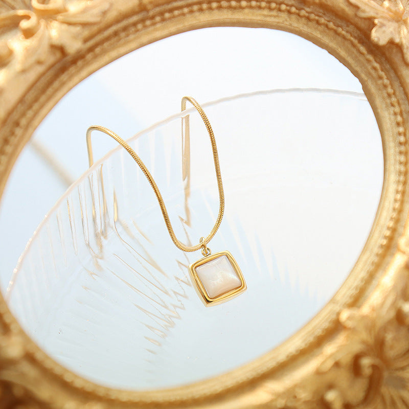 Minimalist square necklace with white shell pendant | Titanium steel 18k gold or steel colors | Understated jewelry design | Scandinavian style