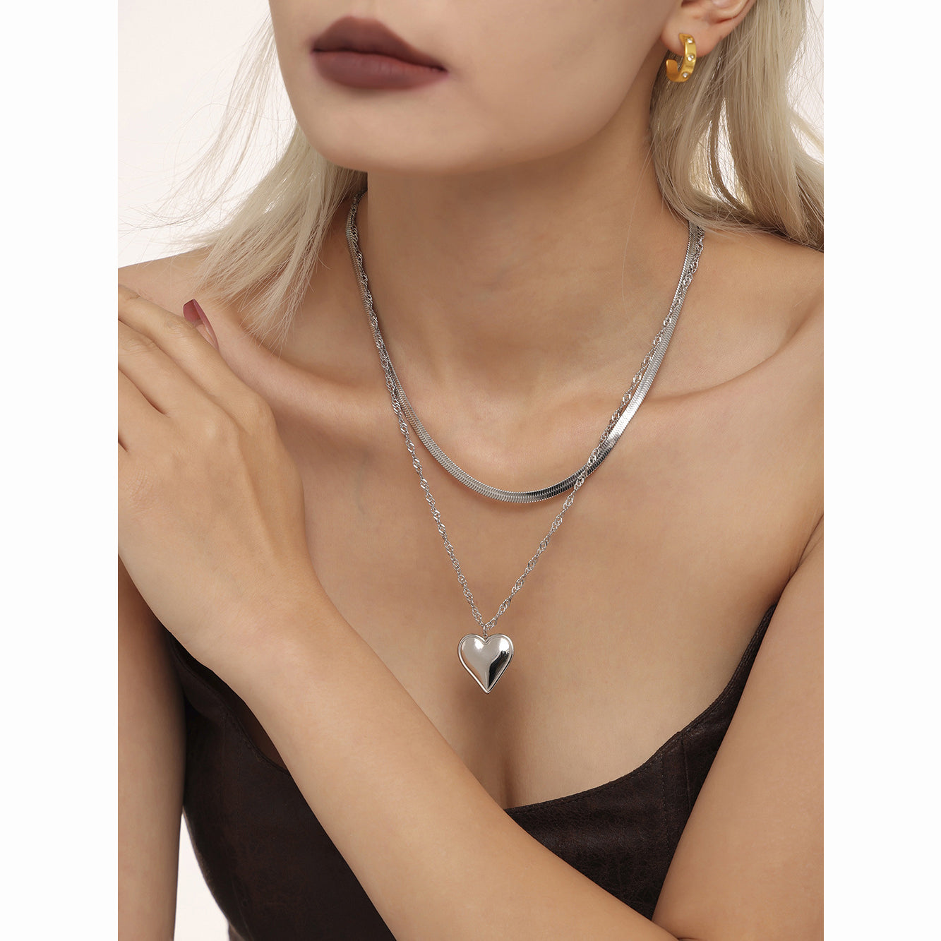 Wave-shaped blade chain with heart pendant | Double-layered stainless steel chain in 18K gold or high-gloss silver look