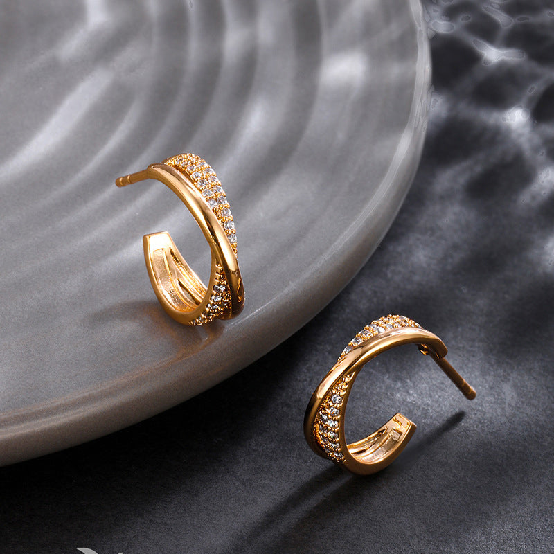 Twisted cross stud earrings 18K gold-plated | Zirconia jewelry | Elegant earrings