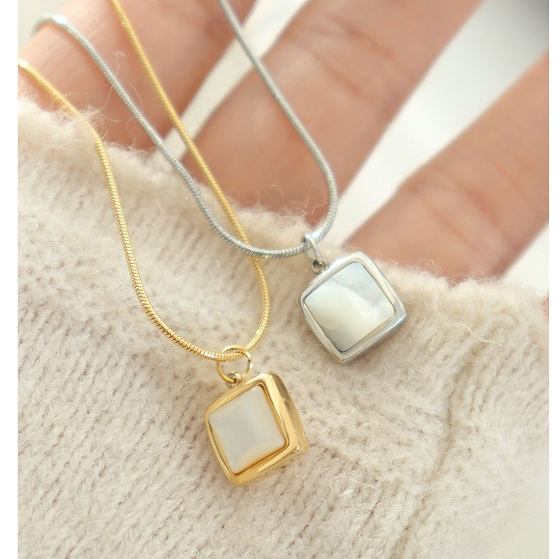 Minimalist square necklace with white shell pendant | Titanium steel 18k gold or steel colors | Understated jewelry design | Scandinavian style