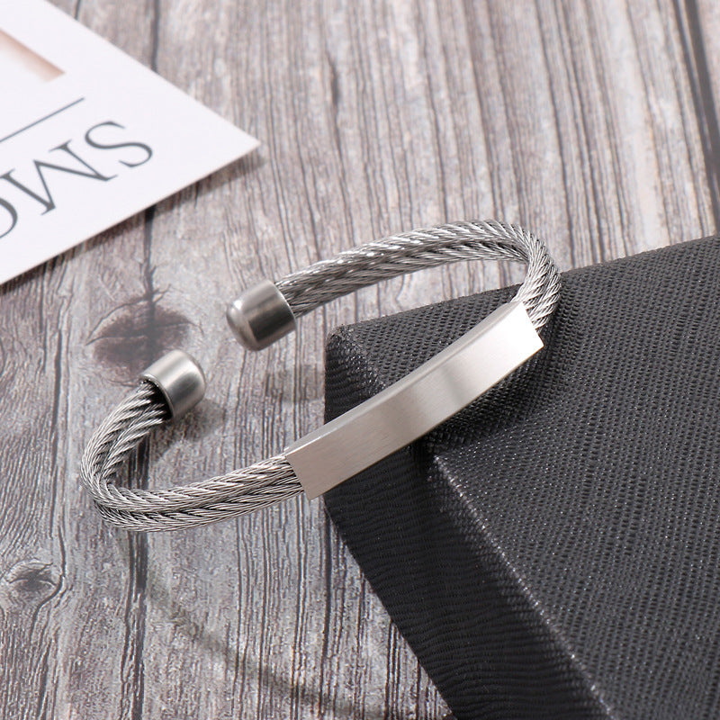 Open men's bracelet made of stainless steel – braided wire rope with twisted look