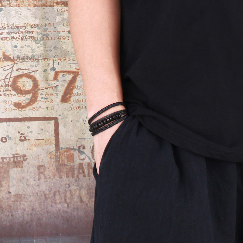 Multi-layered black leather bracelet with stainless steel accents – Hand-woven unique jewelry
