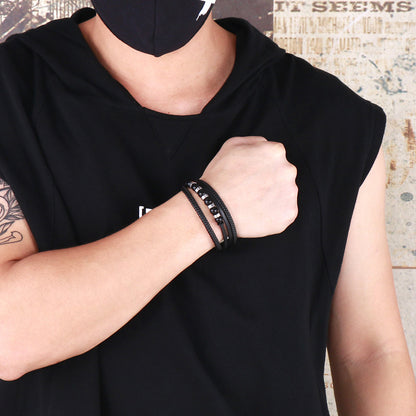 Multi-layered black leather bracelet with stainless steel accents – Hand-woven unique jewelry