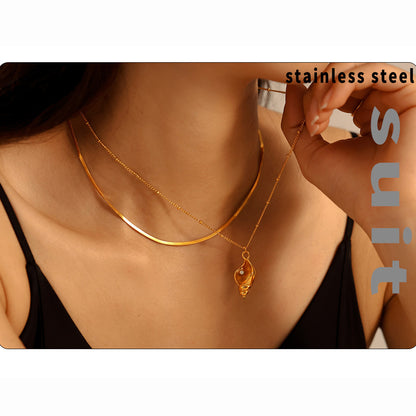 Snail shell pendant necklace with faux pearl | Stackable stainless steel set - 18k gold or high-gloss silver finish