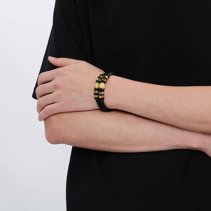 Multi-layered leather braided bracelet made of stainless steel – retro punk design with magnetic clasp