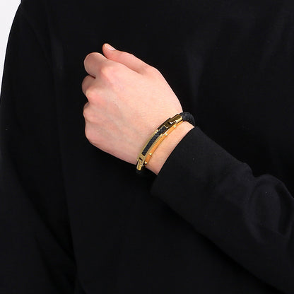 Fashionable men's bracelet made of stainless steel &amp; braided leather - With fiber or steel wire inlays
