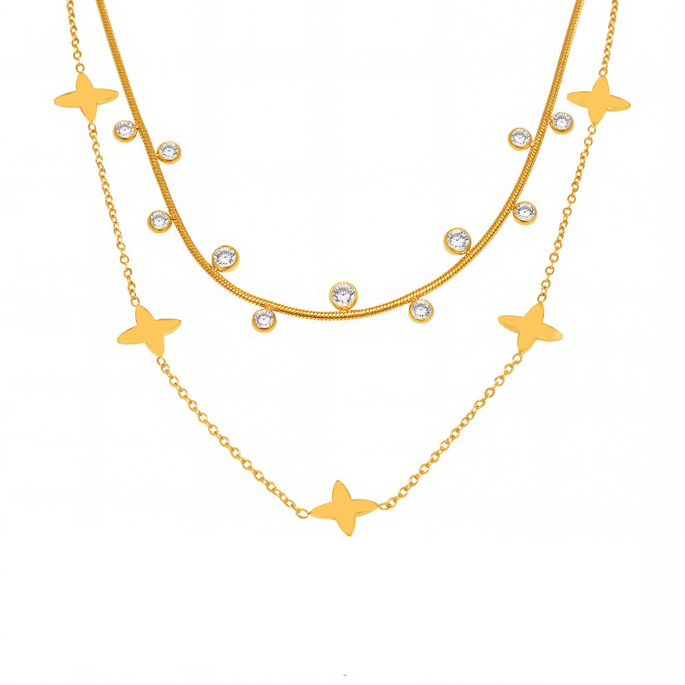 Lucky clover pendant necklace with zirconia and pearls – 18K gold-plated stainless steel or silver look for stylish layering