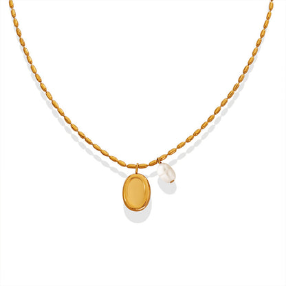 Unique pendant necklace with freshwater pearl &amp; oval plate – gold-plated stainless steel or silver look