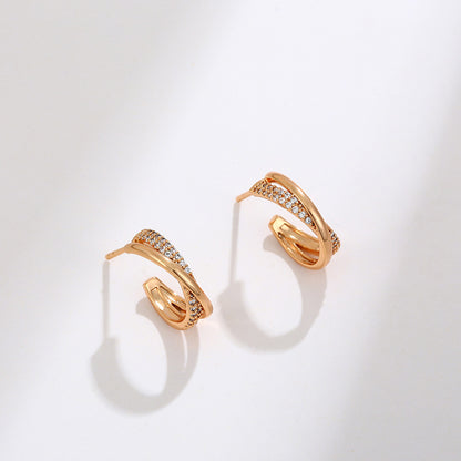 Twisted cross stud earrings 18K gold-plated | Zirconia jewelry | Elegant earrings