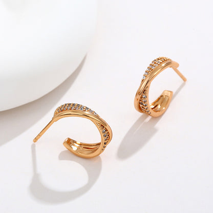 Twisted cross stud earrings 18K gold-plated | Zirconia jewelry | Elegant earrings