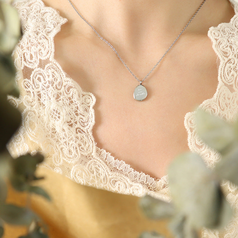 Irregular oval pendant - necklace made of gold-plated stainless steel