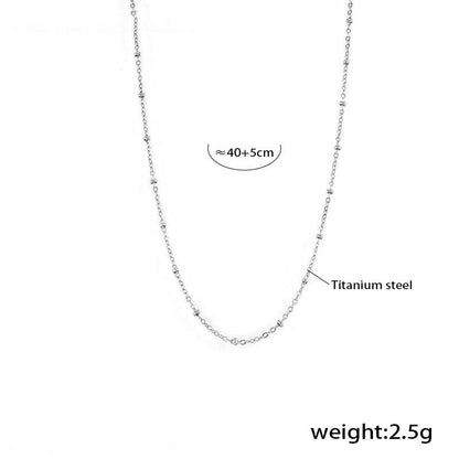 Double chain set: heart pendant with zirconia &amp; cross chain with steel beads – 18K gold-plated or silver stainless steel