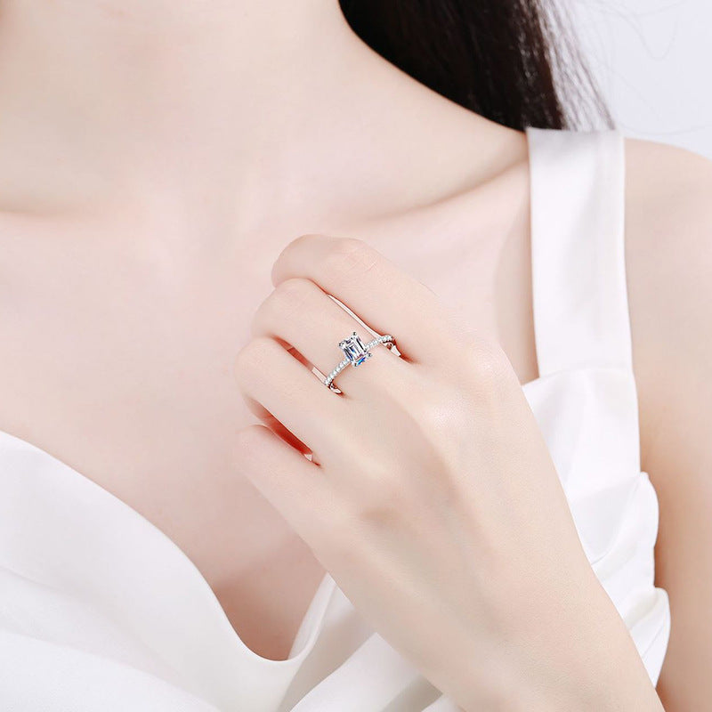 Radiant-cut cubic zirconia ring with 4-claw setting | 1ct main stone (5x7mm) in pavé sterling silver with rhodium plating