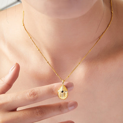 Shell texture cross pendant with zirconia | Stainless steel chain in 18K gold or high-gloss silver