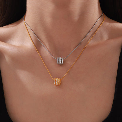 Multi-layered cylinder pendant with zirconia stones | Stainless steel chain in 18K gold or high-gloss silver