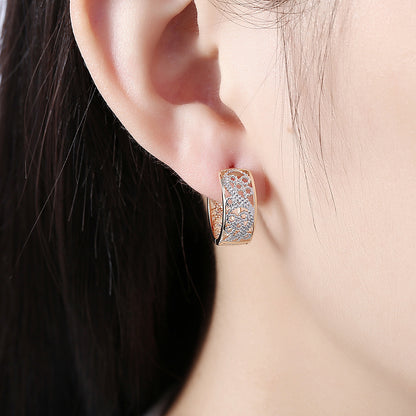 Fashionable perforated ear clips with zirconia - copper gold-plated (1.6 cm)