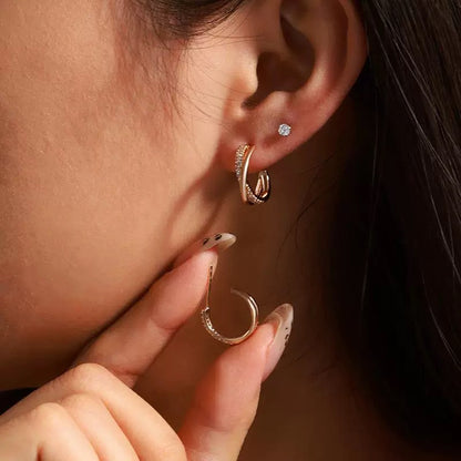 Twisted cross stud earrings 18K gold-plated | Zirconia jewelry | Elegant earrings