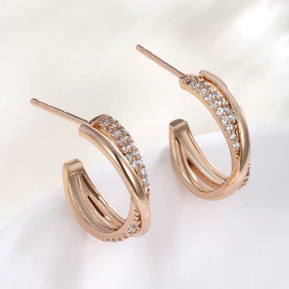 Twisted cross stud earrings 18K gold-plated | Zirconia jewelry | Elegant earrings