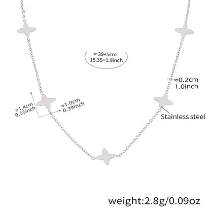 Lucky clover pendant necklace with zirconia and pearls – 18K gold-plated stainless steel or silver look for stylish layering