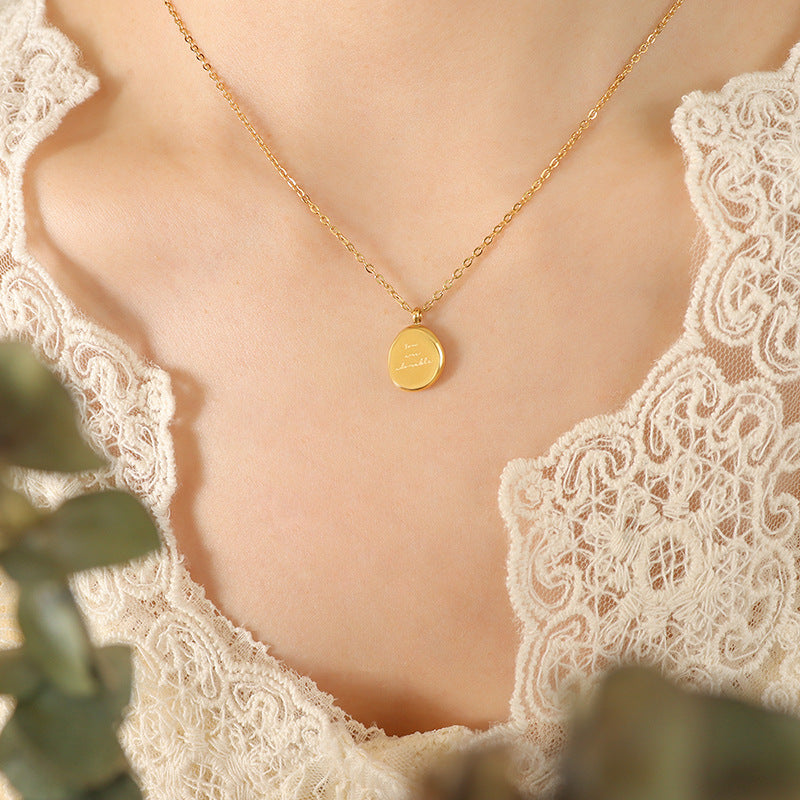 Irregular oval pendant - necklace made of gold-plated stainless steel