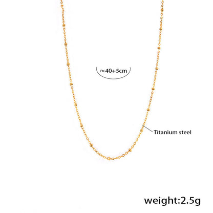 Double chain set: heart pendant with zirconia &amp; cross chain with steel beads – 18K gold-plated or silver stainless steel