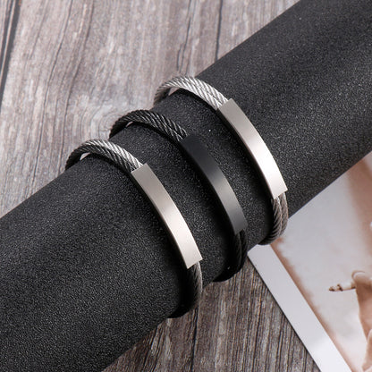 Open men's bracelet made of stainless steel – braided wire rope with twisted look