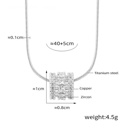 Multi-layered cylinder pendant with zirconia stones | Stainless steel chain in 18K gold or high-gloss silver