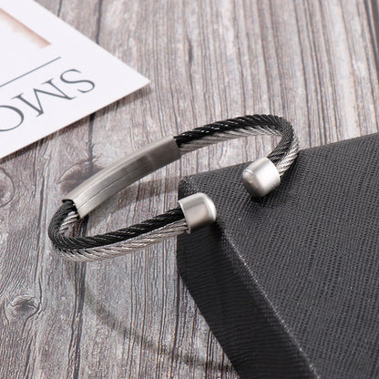 Open men's bracelet made of stainless steel – braided wire rope with twisted look
