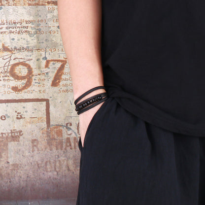Multi-layered black leather bracelet with stainless steel accents – Hand-woven unique jewelry