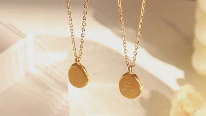 Irregular oval pendant - necklace made of gold-plated stainless steel